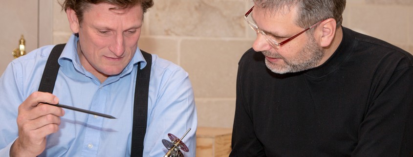 Stephen Forsey and Robert Greubel discussing the original Meccano proof-of-concept model of their double tourbillon 30° invention