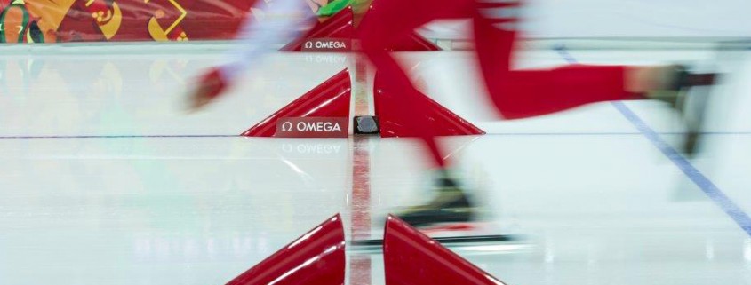 Speed skating crossing finish line