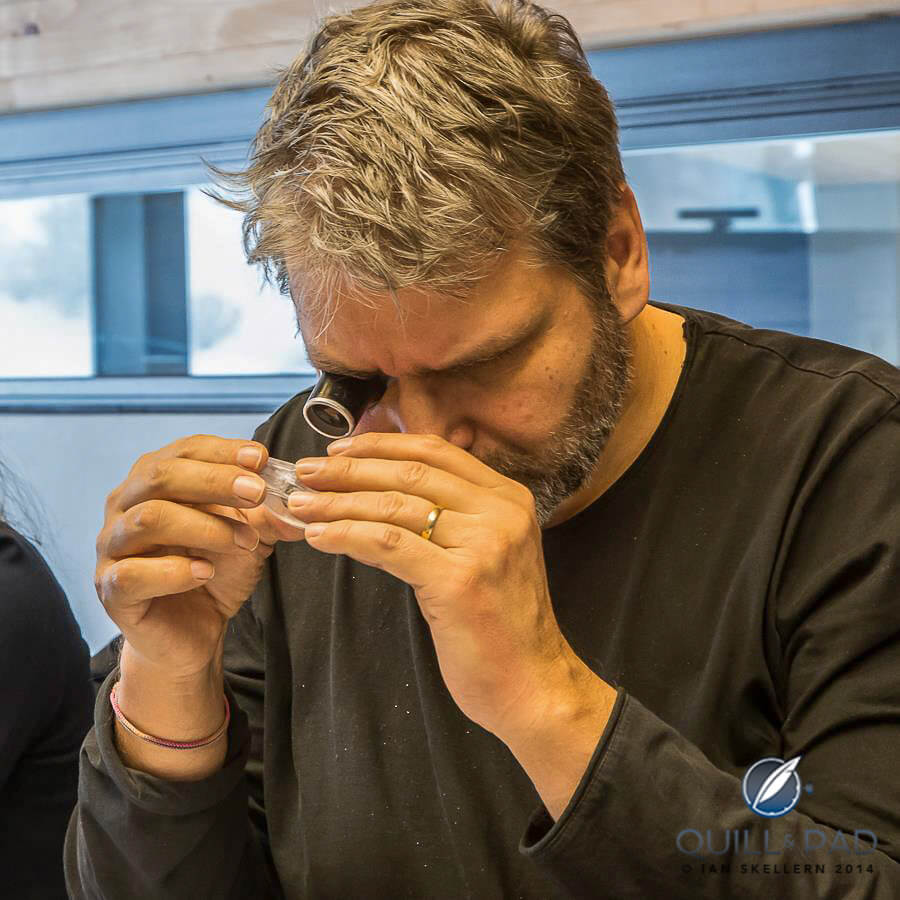 Robert Greubel carefullly examining the quality of Michel's work