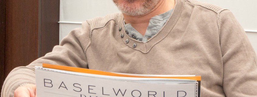 Vianney Halter reading the Baselworld News wearing his Deep Space Tourbillon