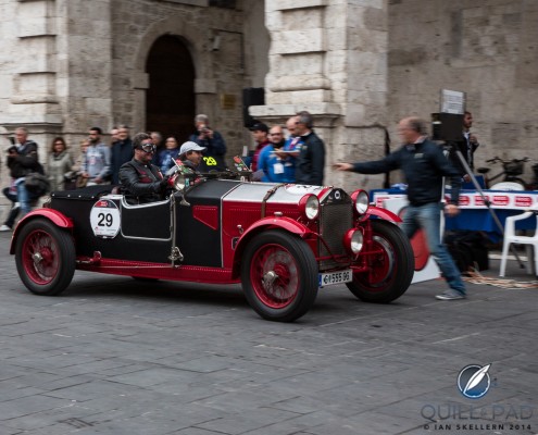 2014_Mille_Milgia_Day-2_1493 1927 Lancia series VII crossing a time trial line in the 2014 Mille Miglia