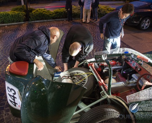 2014_Mille_Milgia_Day-2_1527 Pitstop for new battery for a 1957 Lotus Eleven Climax Le Mans in the 2014 Mille Miglia