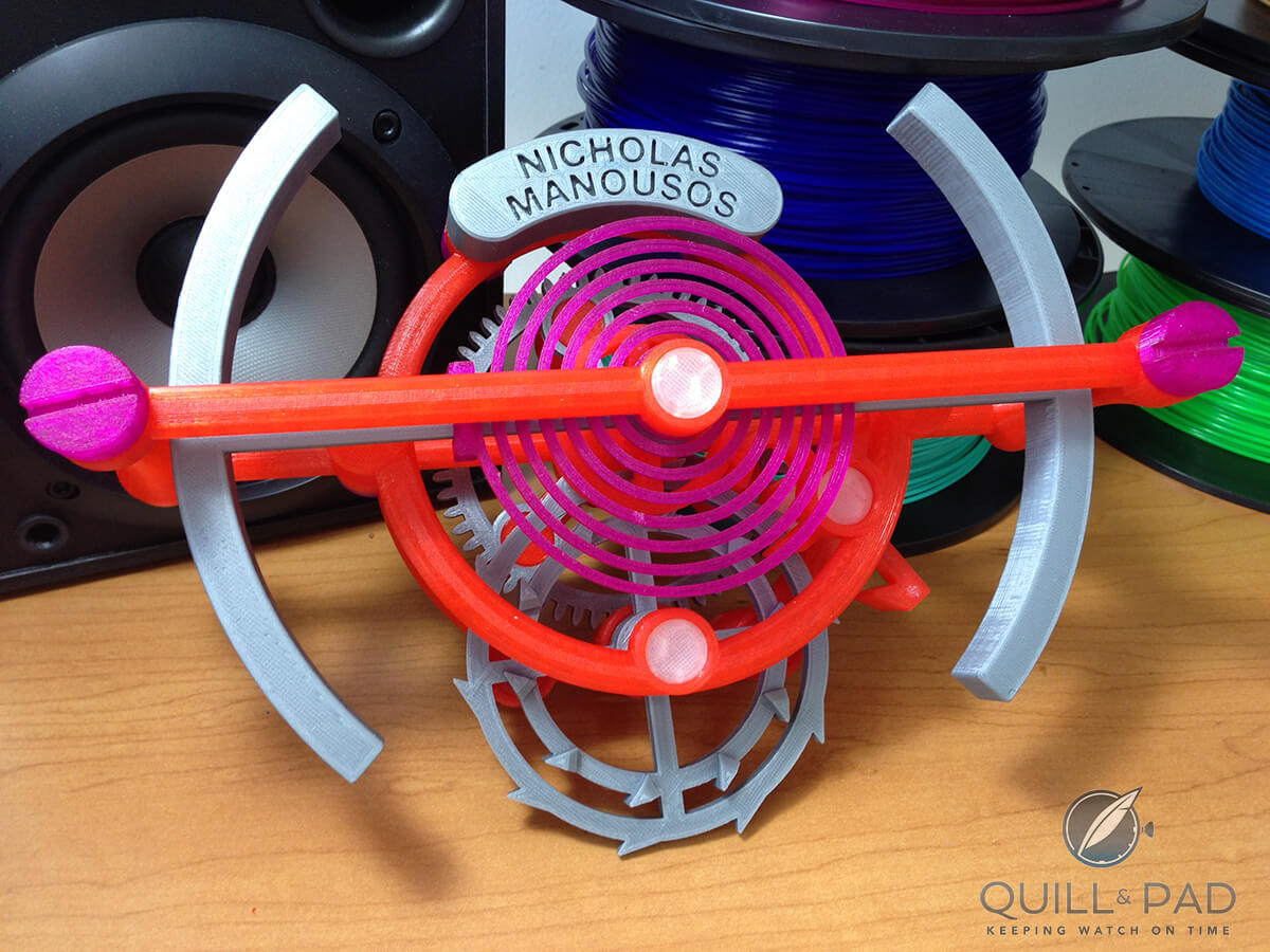Brightly colored model of a tourbillon with co-axial escapement designed by Nicholas Manousos