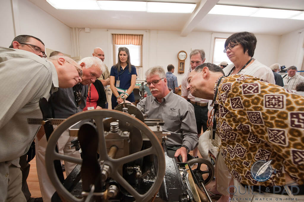 Roland Murphy explaining machine to guests at the National Watch and Clock Museum in Columbia, Pennsylvania