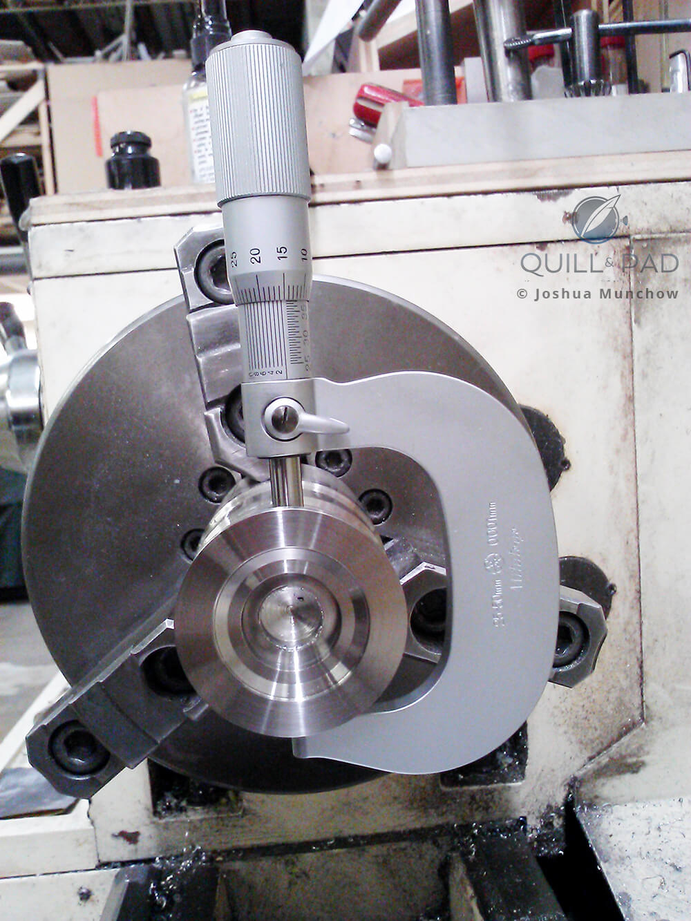 Turning the caseback, measuring to 0.001 millimeters