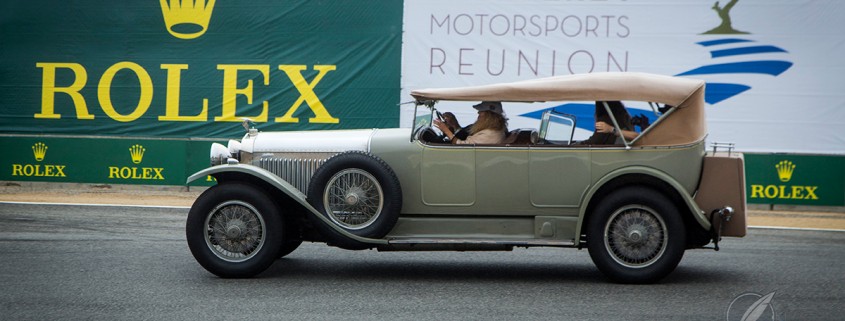 The 1923 Hispano-Suiza takes a lap around the Laguna Seca Mazda speedway as part of the Pebble Beach Tour d’Elegance