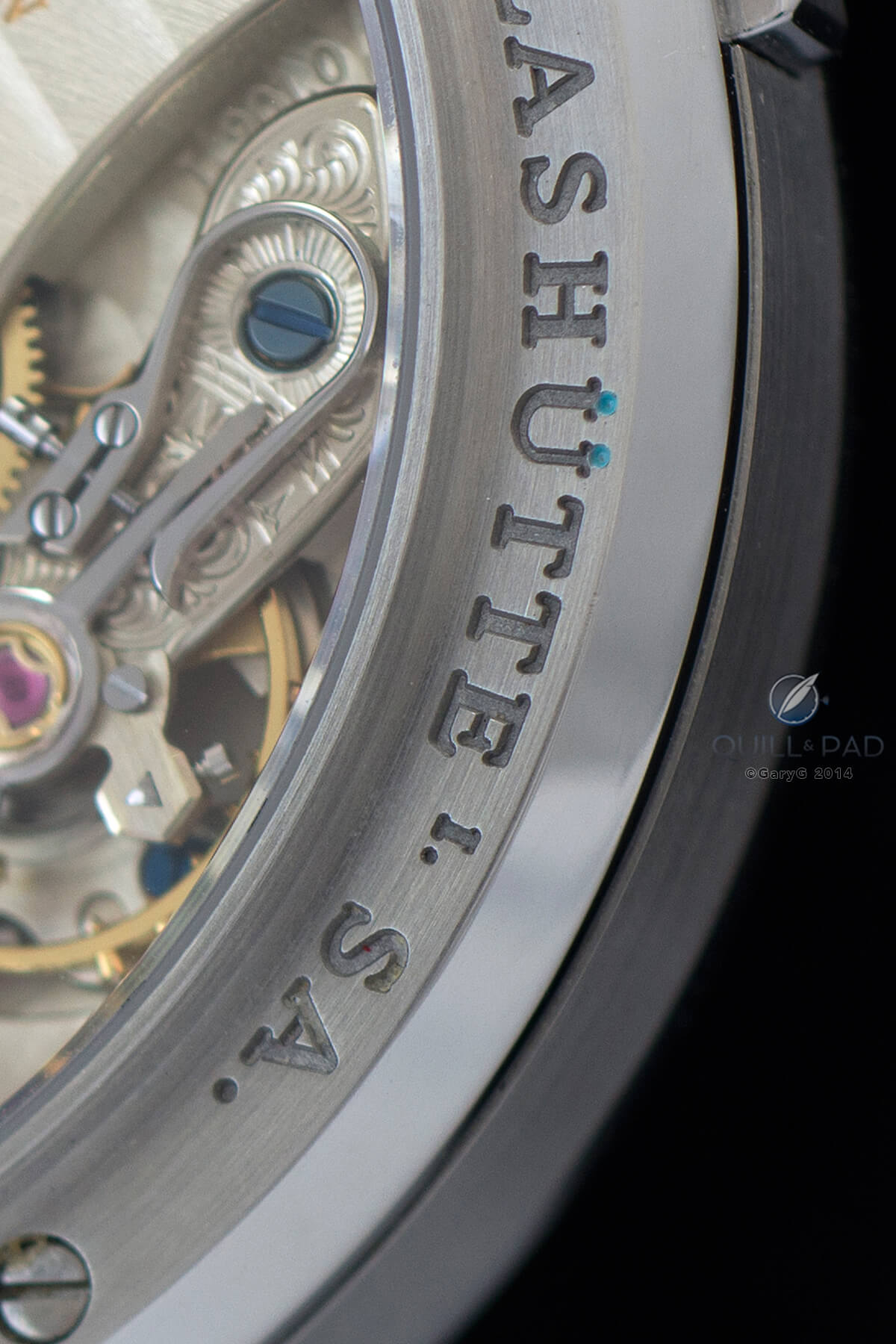 Mysterious blue/green dots on the A. Lange & Söhne Lange 1 in stainless steel
