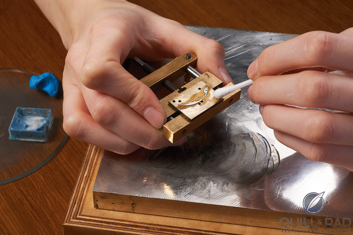 Polishing a steel spring for Tutima's minute repeating Caliber 800