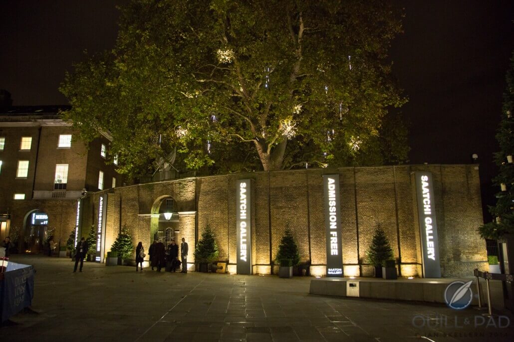 The Saatchi Gallery and SalonQP remain out of sight from the bustling crowds passing by on the other side of this wall