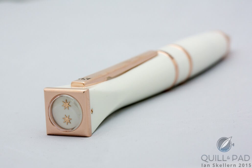 Jaquet Droz double star motif in 18-karat red gold applied to enamel underneath the sapphire crystal dome