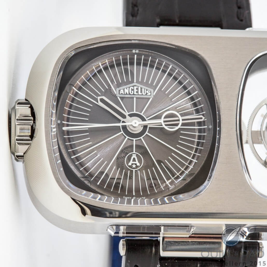 The smoked-sapphire dial of the Angelus U10 Tourbillon Lumière subtly reveals the movement