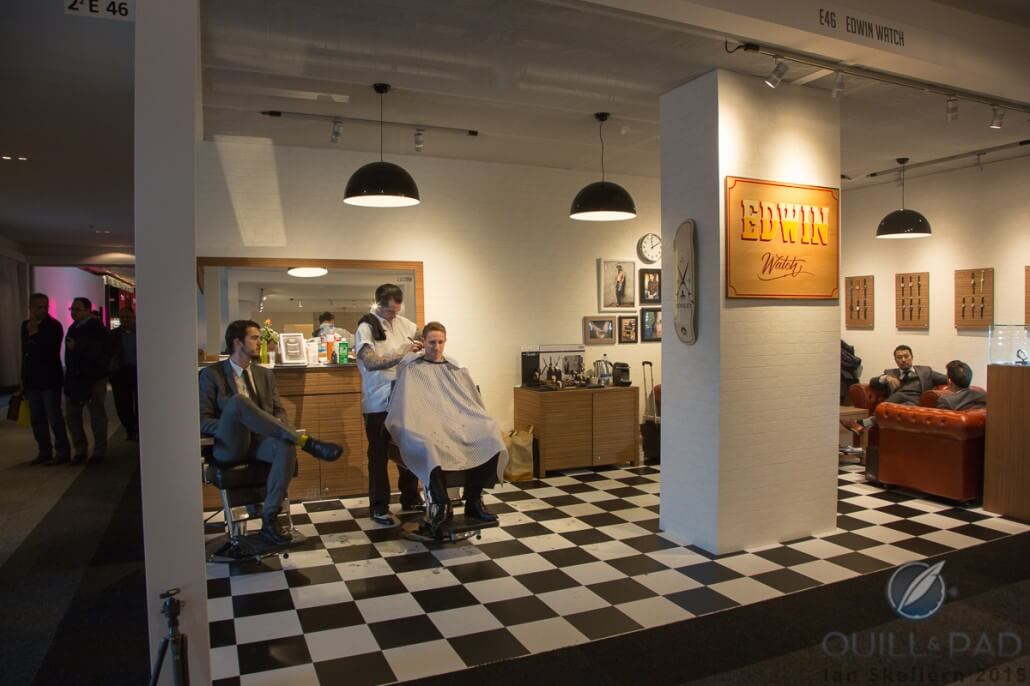 Barber at the Edwin Watch stand