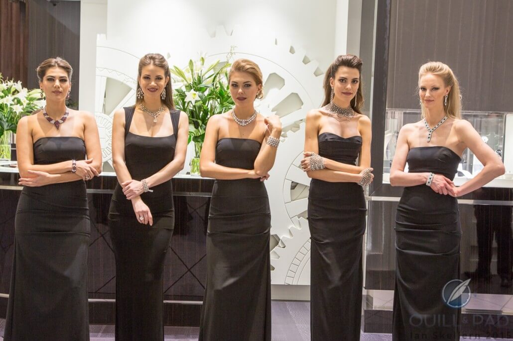 Jewel-adorned hostesses at the Jacob & Co. booth at Baselworld
