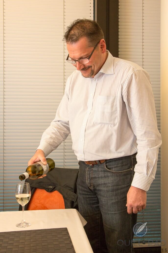 Pascal Dubois of Dubois Dépraz pouring wine during an evening get-together that happened to convene at Rudis Sylva
