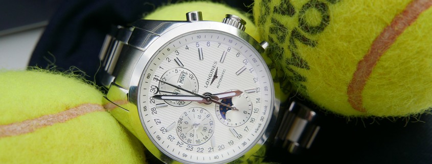 Longines Conquest Classic Moonphase in a nest of tennis balls