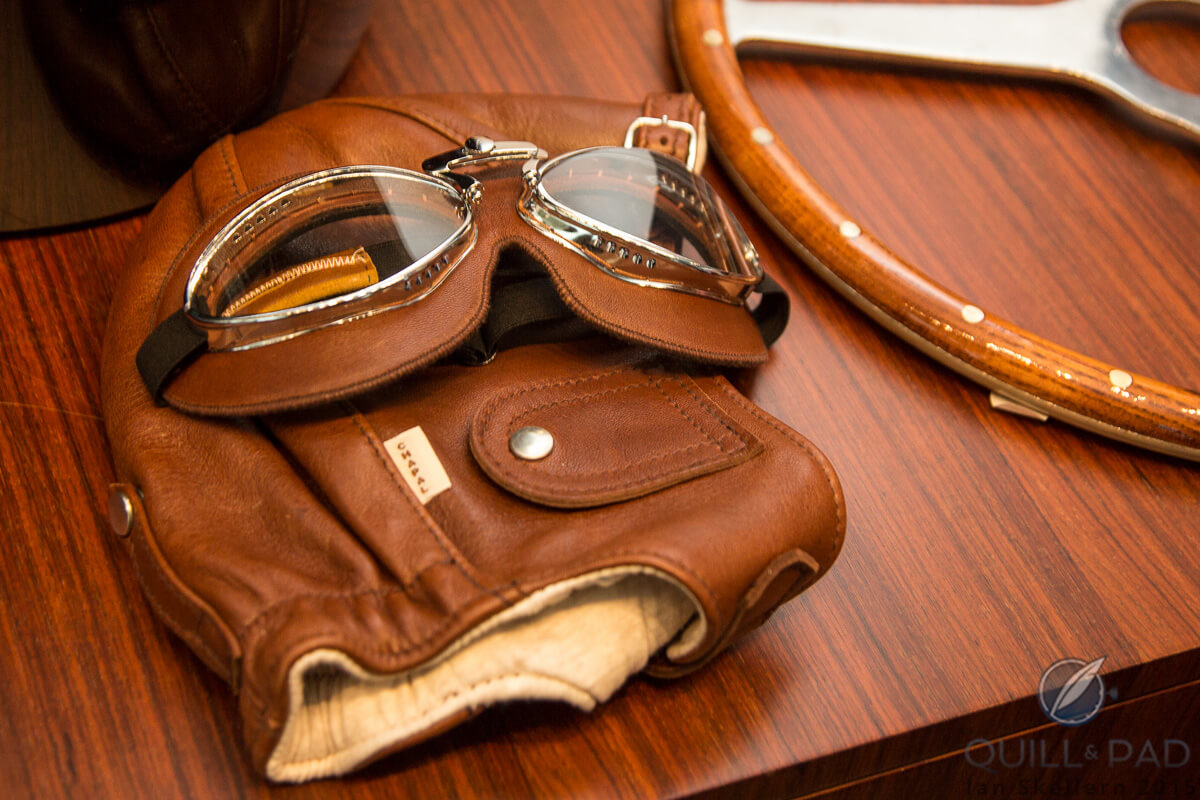 Old-school driving accessories: leather helmet and gloves
