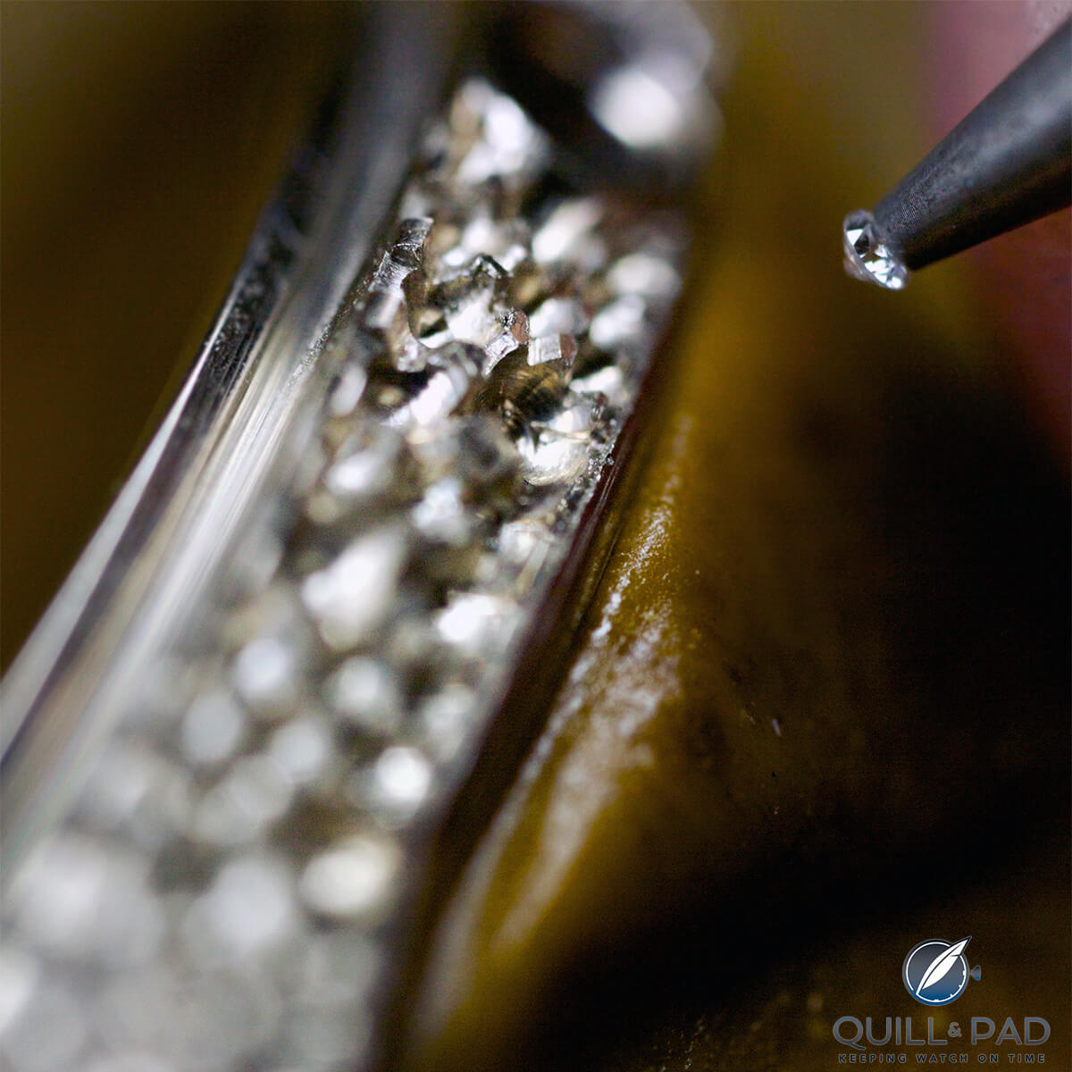 I think this one goes here: Snow setting diamonds around a Hermès Arceau Temari case band