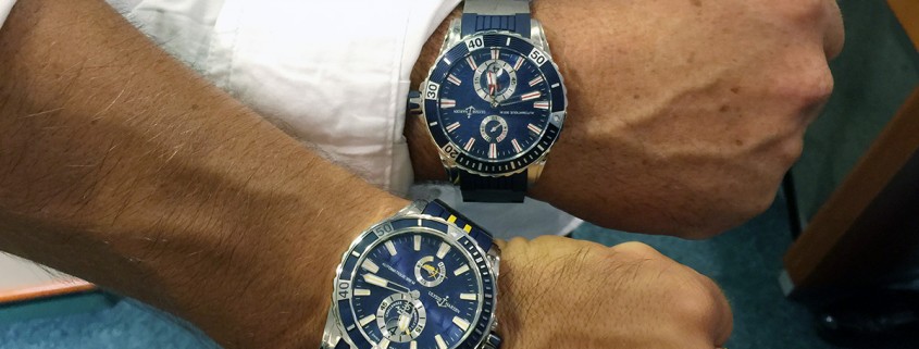 Christian Kamp and the legendary Loïck Peyron modeling Ulysse Nardin in Bermuda; Kamp (lower wrist) is wearing the limited edition Ulysse Nardin Marine Diver Artemis Racing