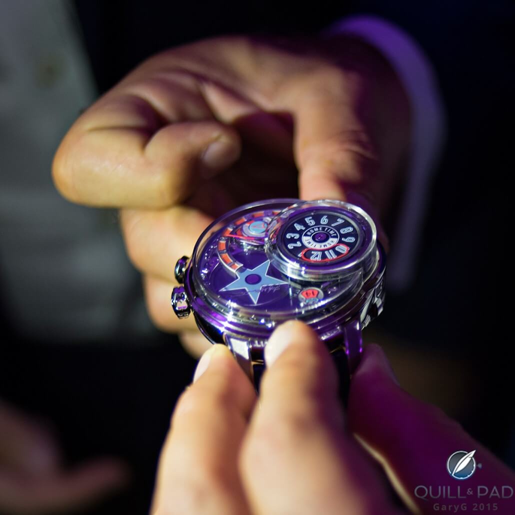 The star logo of the Harry Winston Opus 14 fully deployed and second time zone fully hidden