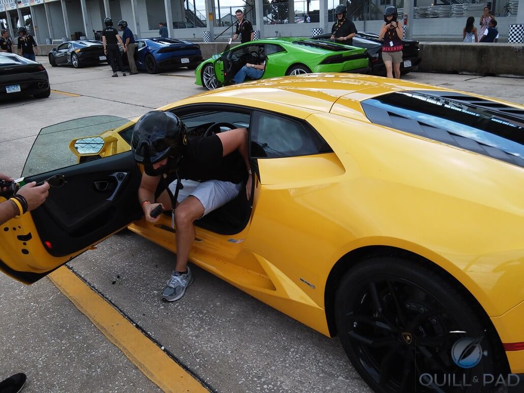The author exits a Corsa yellow Lamborghini Huracan during the Blancpain Lamborghini Super Trofeo world finals weekend at the Sebring Motor Speedway