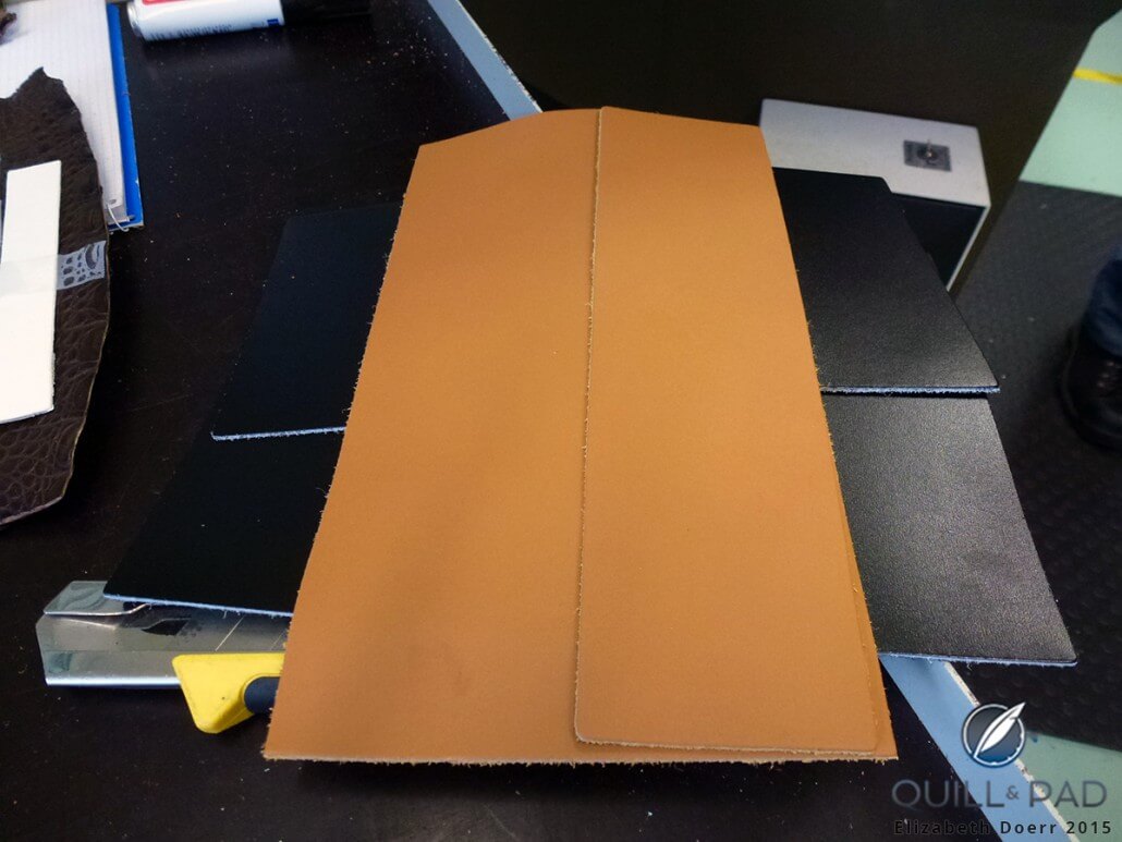 Pre-cut black Barenia and Zermatt calfskin leathers in La Montre Hermès' strap workshop