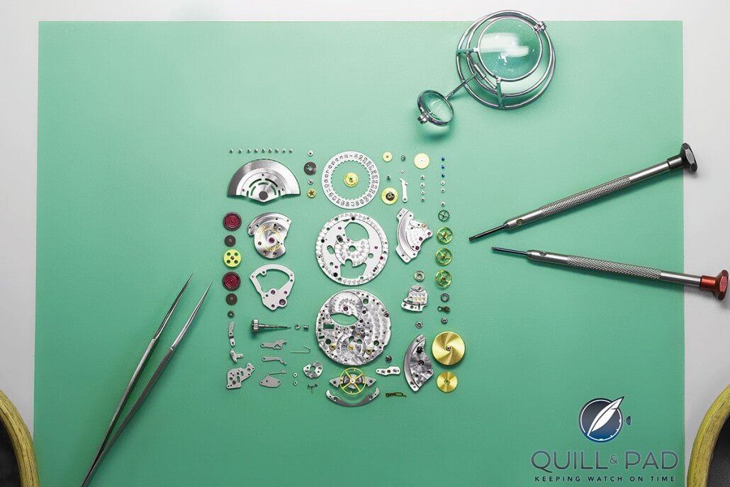 Rolex Caliber 3135 disassembled by a Watch Gallery watchmaker; note the red Teflon-coated gear wheels