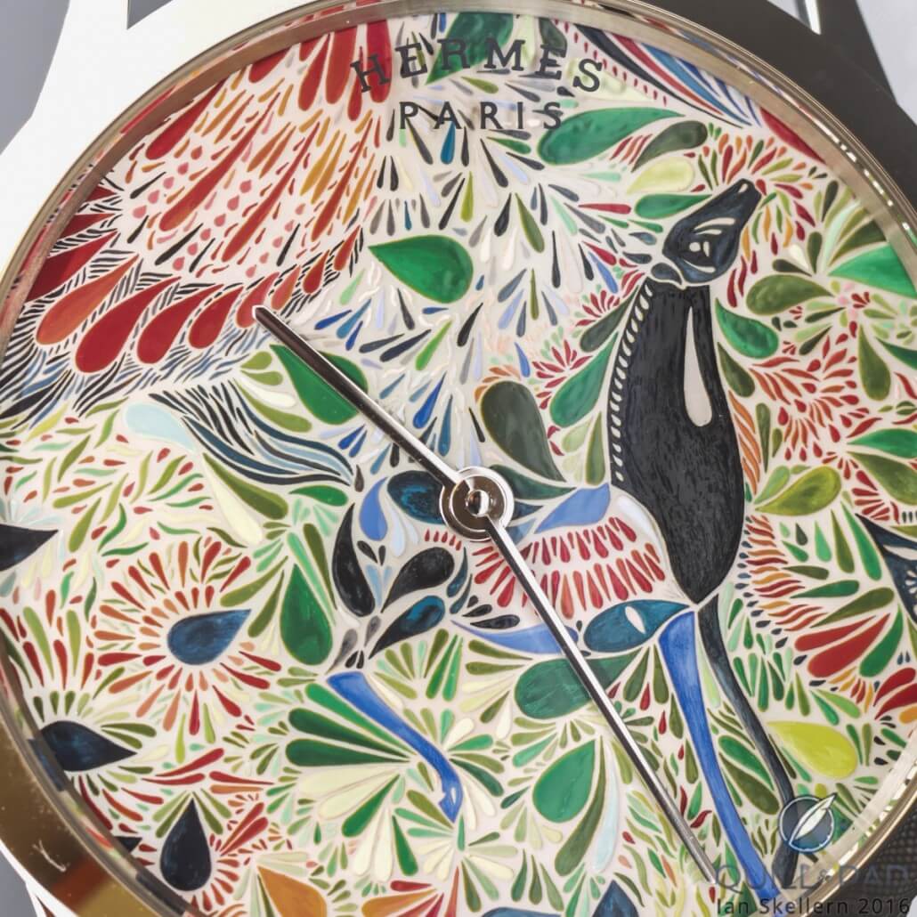 A close look at the miniature painting on mother-of-pearl dial of the Slim d’Hermès Mille Fleurs du Mexique