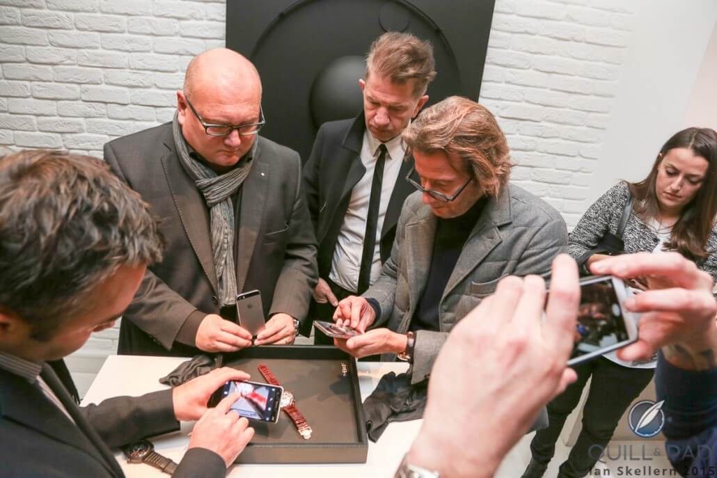 Frantically checking stock portfolios to see if the watch is affordable