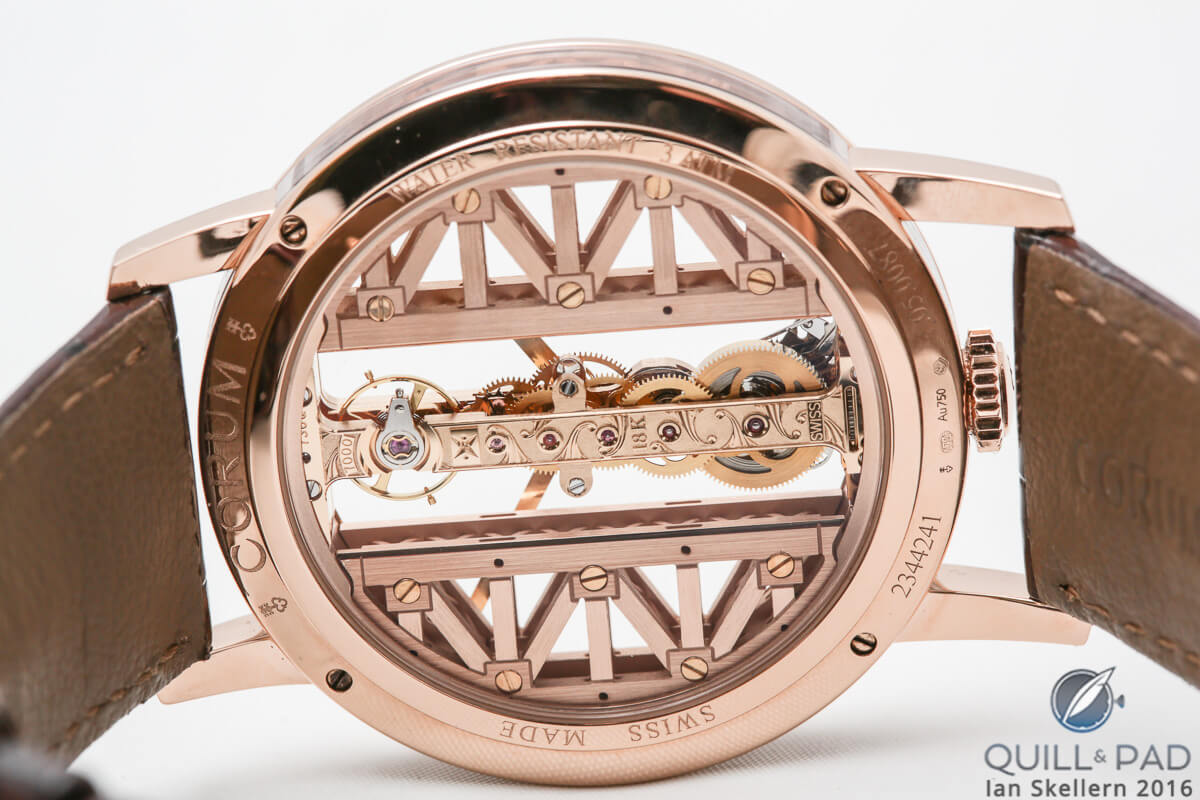 View through the display back of the Corum Golden Bridge Ronde in red gold