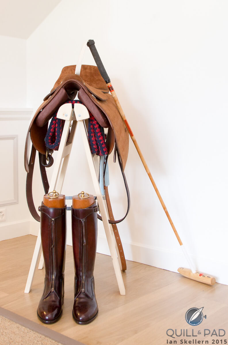 saddle, books and polo stick