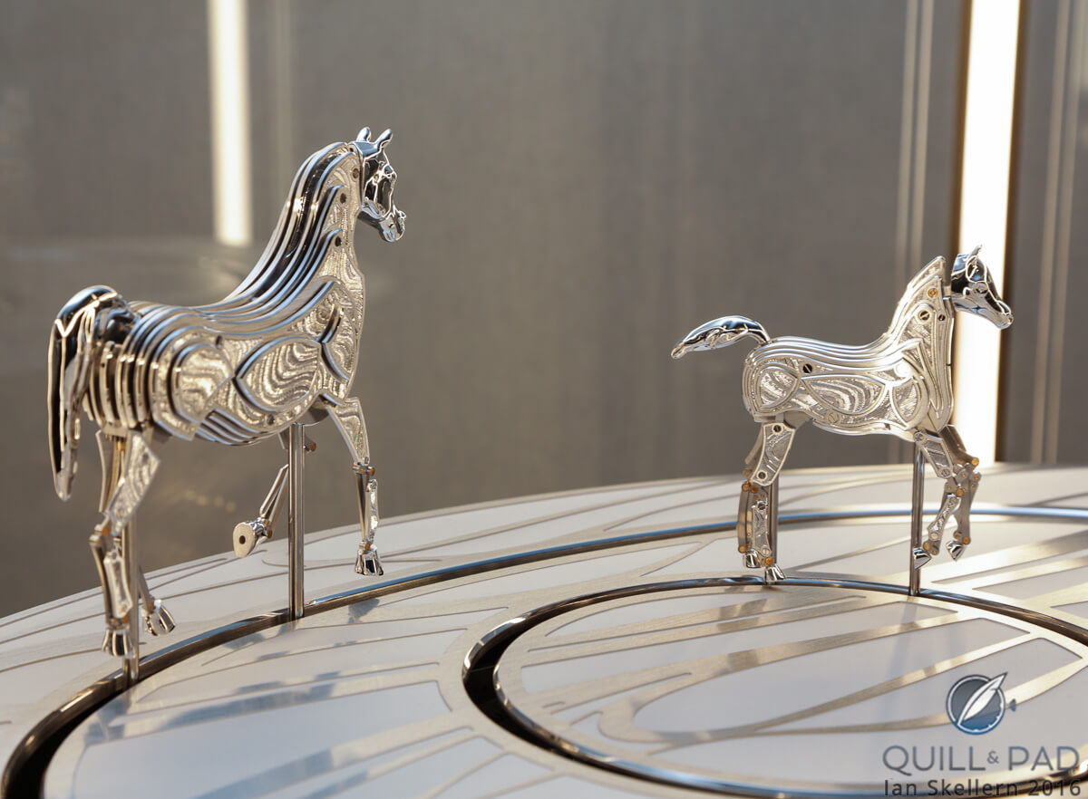 Mare and foal chasing each other around the Parmigiani Hippologia