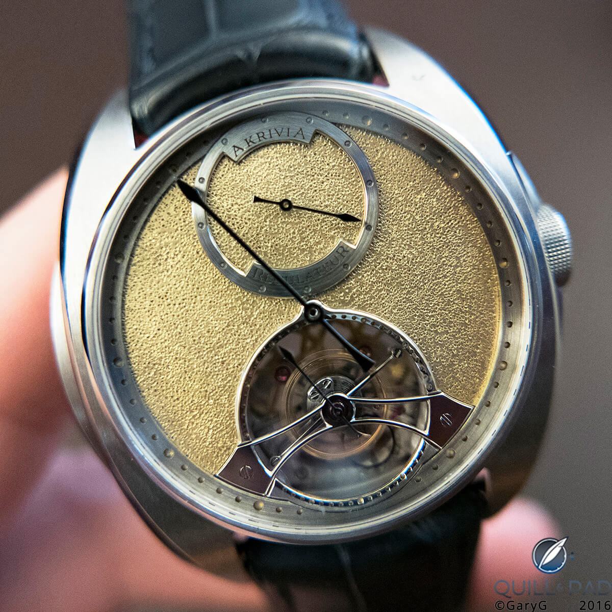 Akrivia Tourbillon Regulateur with hammered gold dial
