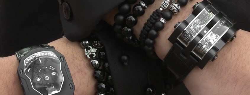 Urwerk UR-105 Dark Knight (left) and black Cabestan Winch on the wrist