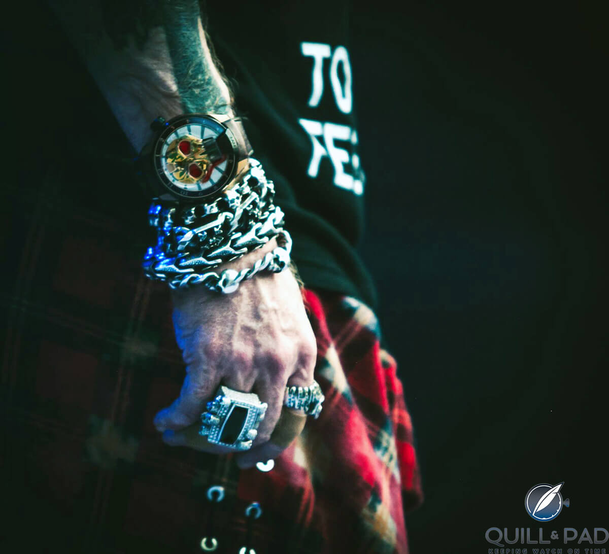 Axl Rose wearing a HYT Skull Maori on stage