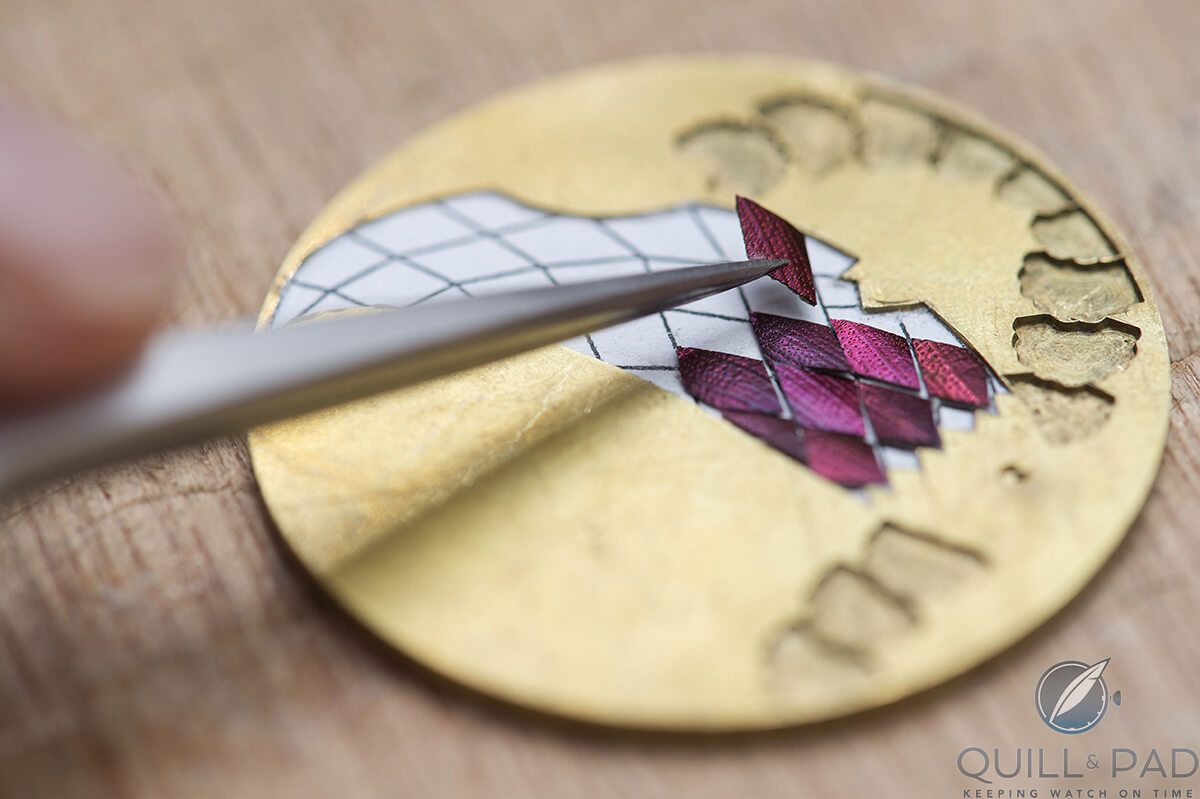 Adding delicate scarab shell to the mosaic dial of the Hermès Arceau Pocket Ailes et Ecailles