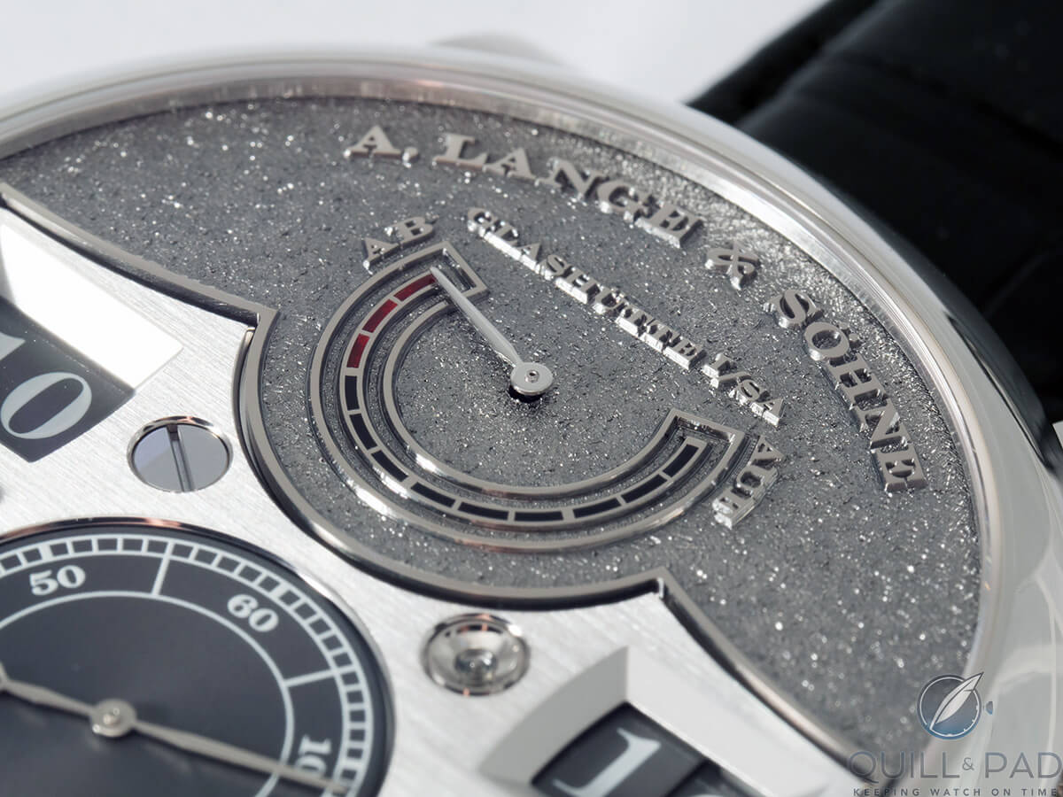 Close up look at the distinctive tremblage engraving on the dial of the A. Lange & Söhne Zeitwerk Handwerkskunst