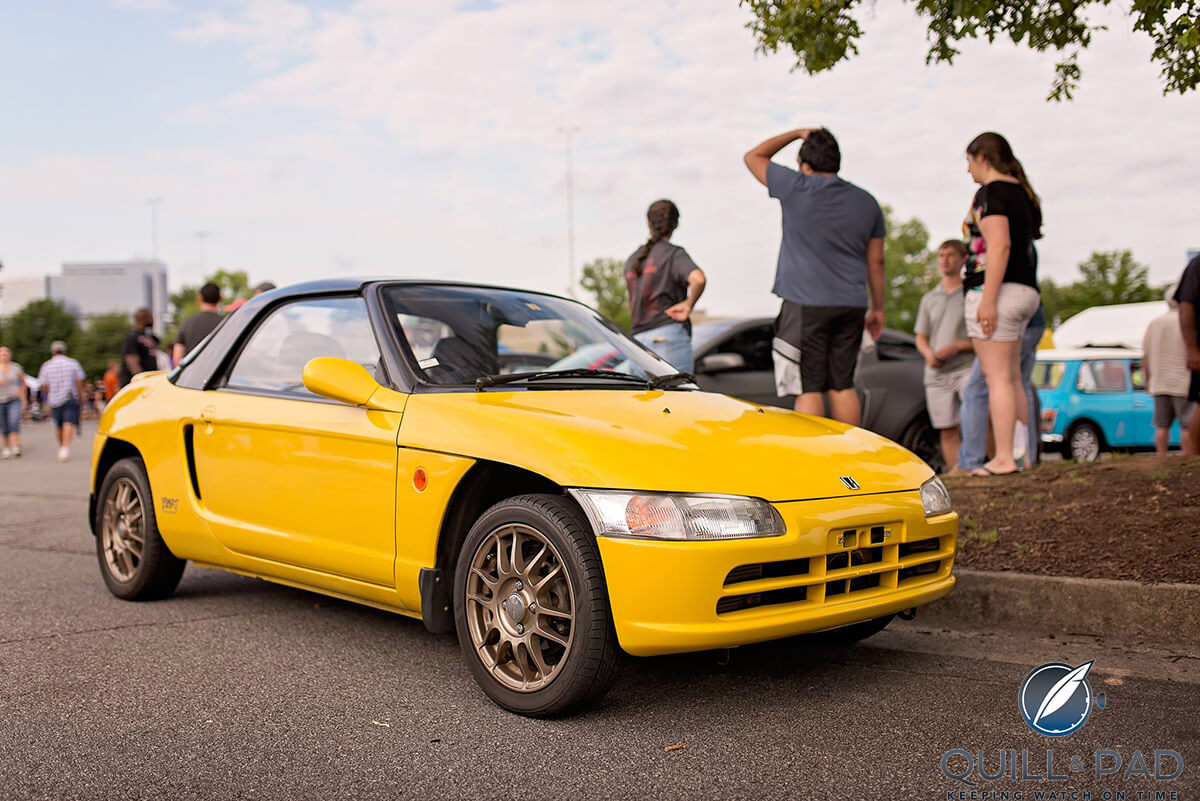 The author's bright yellow Honda Beat
