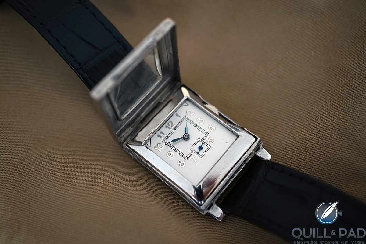The top of the case of the Blancpain Rolls by Léon Hatot open to allow access to the time-setting disk