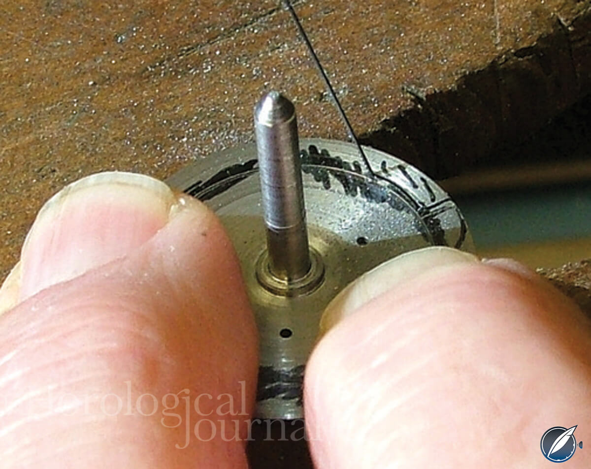 Cutting the fusee stop of Derek Pratt's H4 reconstruction (photo courtesy British Horological Journal)