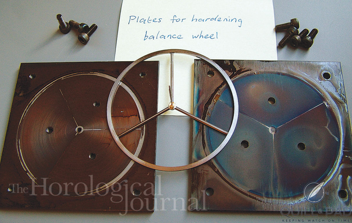 Balance wheel hardening plates for Derek Pratt’s H4 showing the balance at a later stage with the staff and collet in place.