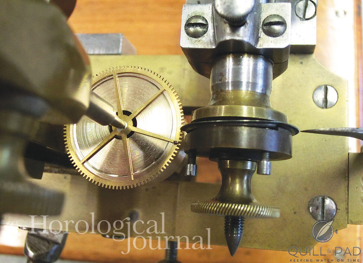 Topping the centre seconds drive wheel