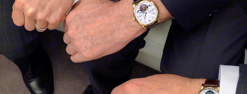 Group A. Lange & Söhne Pour le Mérite Tourbillon wristshot with Walter Lange at center, 2013