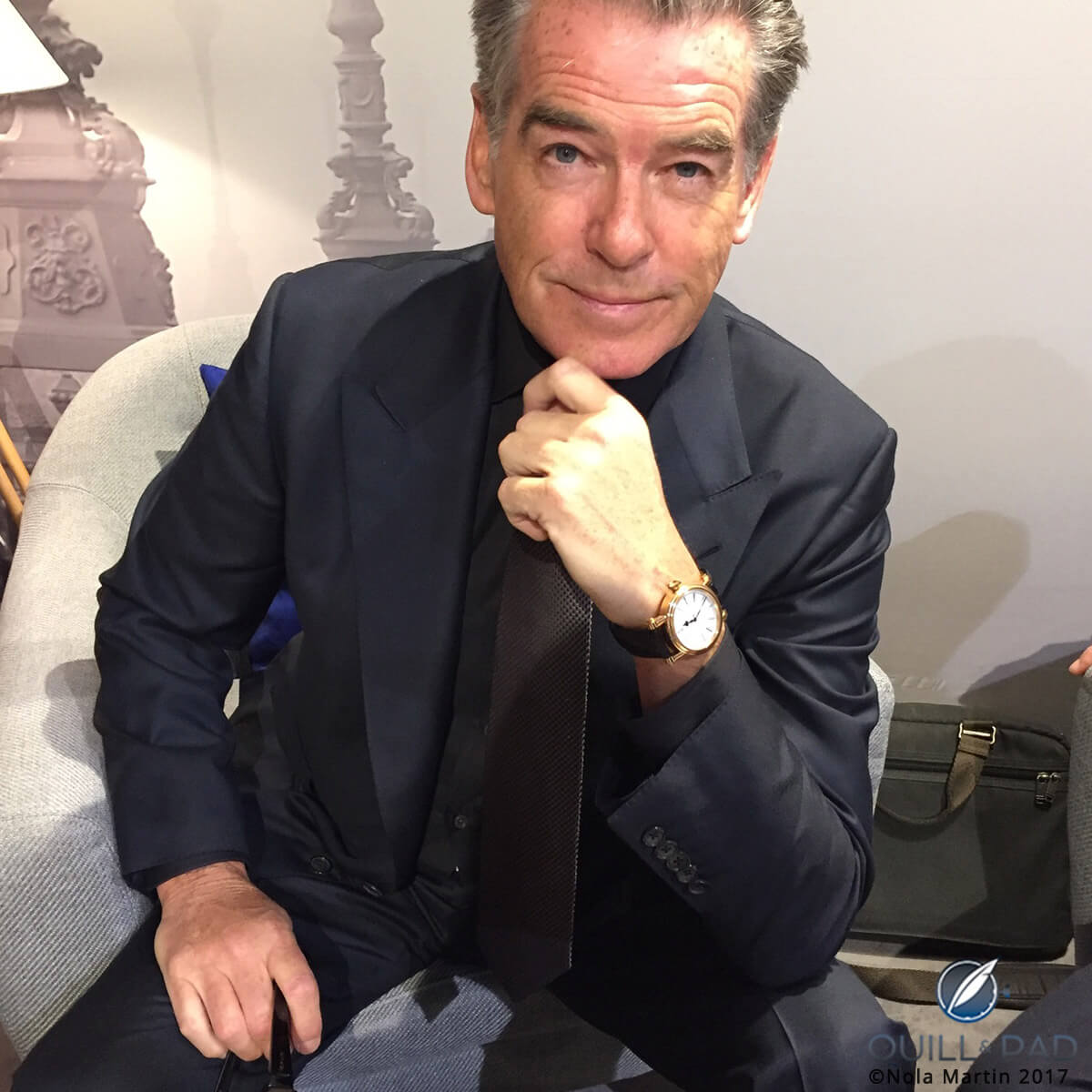 Pierce Brosnan wearing his Speake-Marin Resilience in red gold