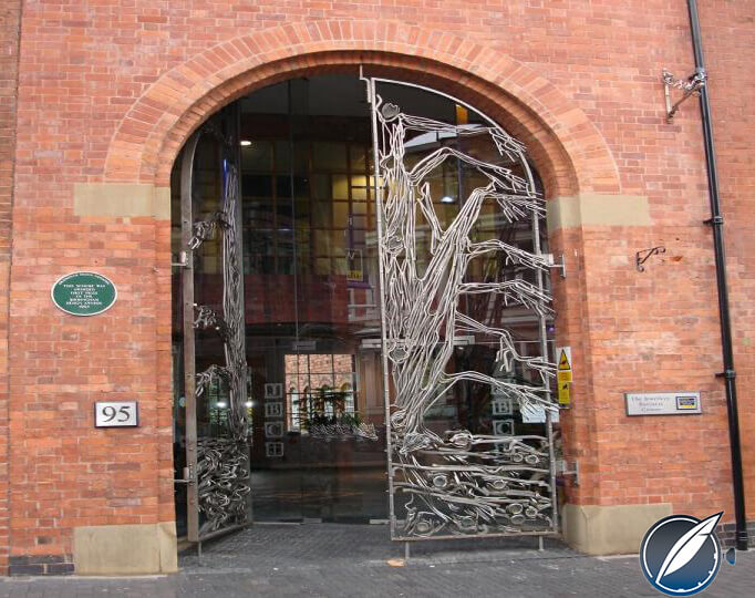 Tree motif on the door at the entrance to the Yard-O-Led factory in Birmingham, England