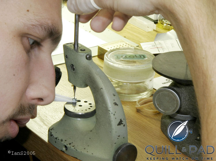 Watchmaker Sébastien assembling an hour satellite for the Opus V in 2005, at that time Urwerk's watchmaking team was just Felix Baumgartner and himself