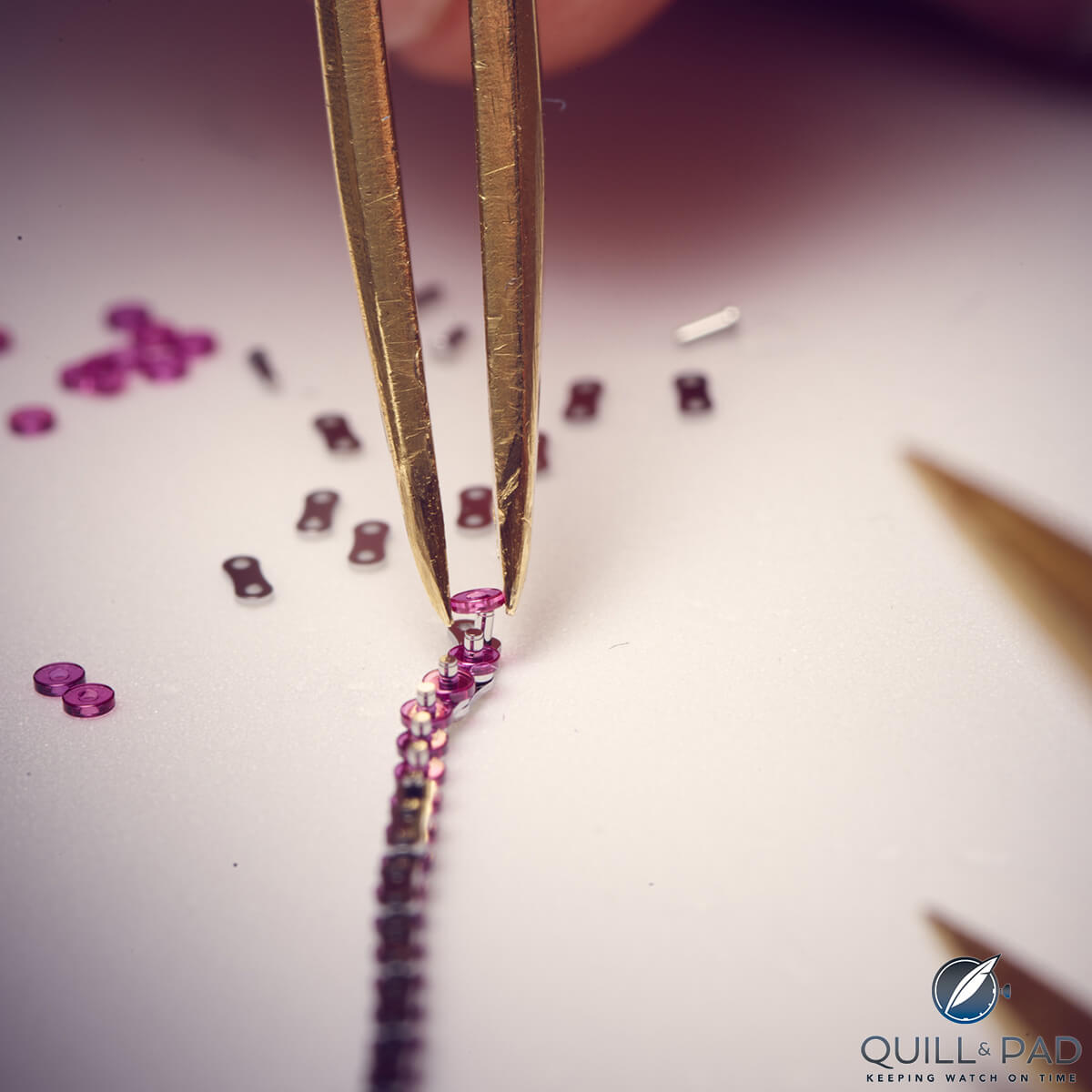 Assembling a patented ruby link constant force chain of Romain Gauthier's Logical One