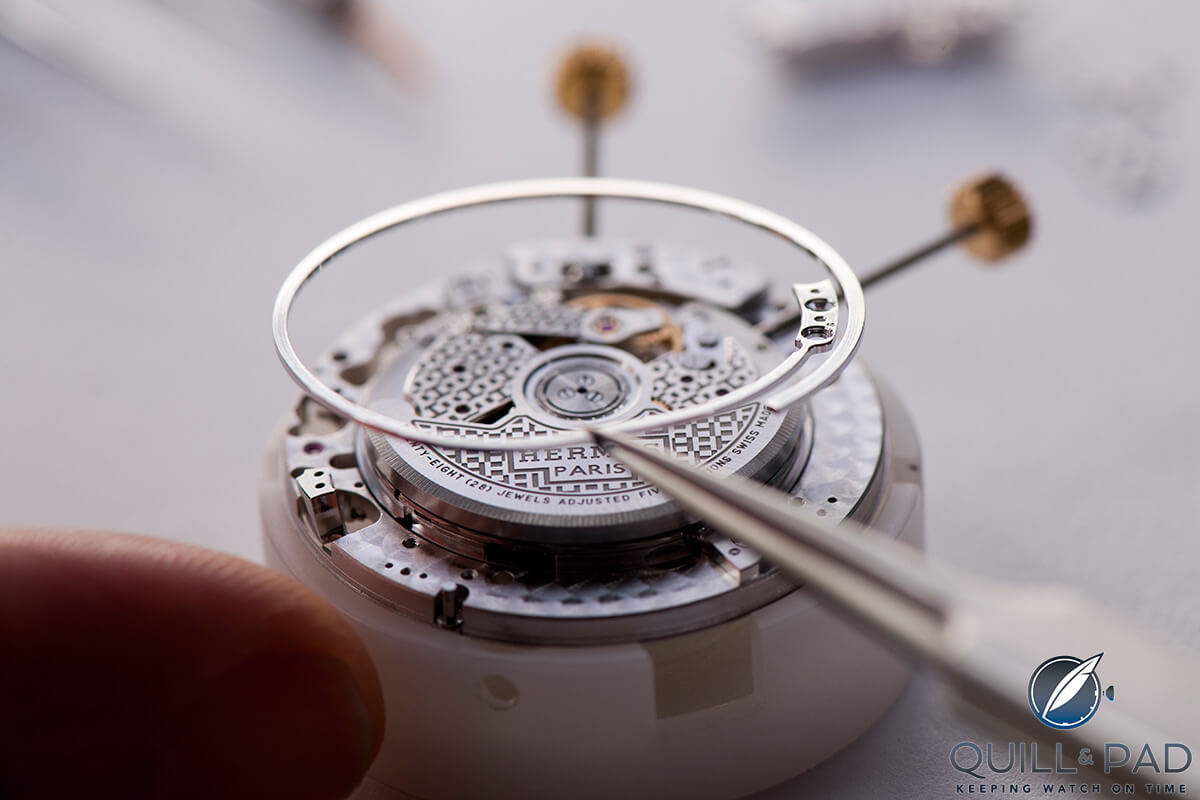 Chiming gong being added to the movement of the Hermès L’Heure Impatiente