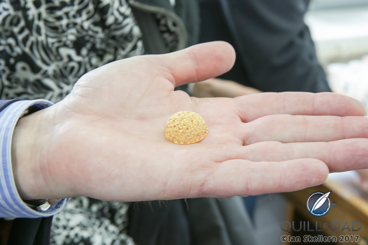 An extremely complicated piece of 18-karat yellow gold filigree art fresh off the bench at Eleuterio