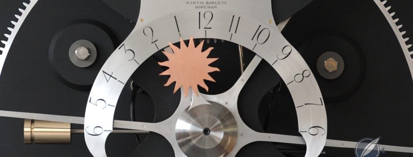 Hour display with sun hand on the Burgess Clock B, completed by Charles Frodsham & Co