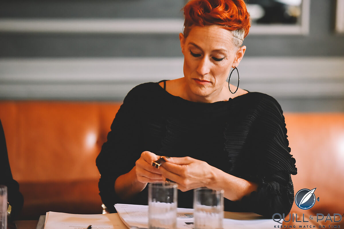 New jury member Sara Sandmeier examining a contender for the 2017 Eve's Watch Awards